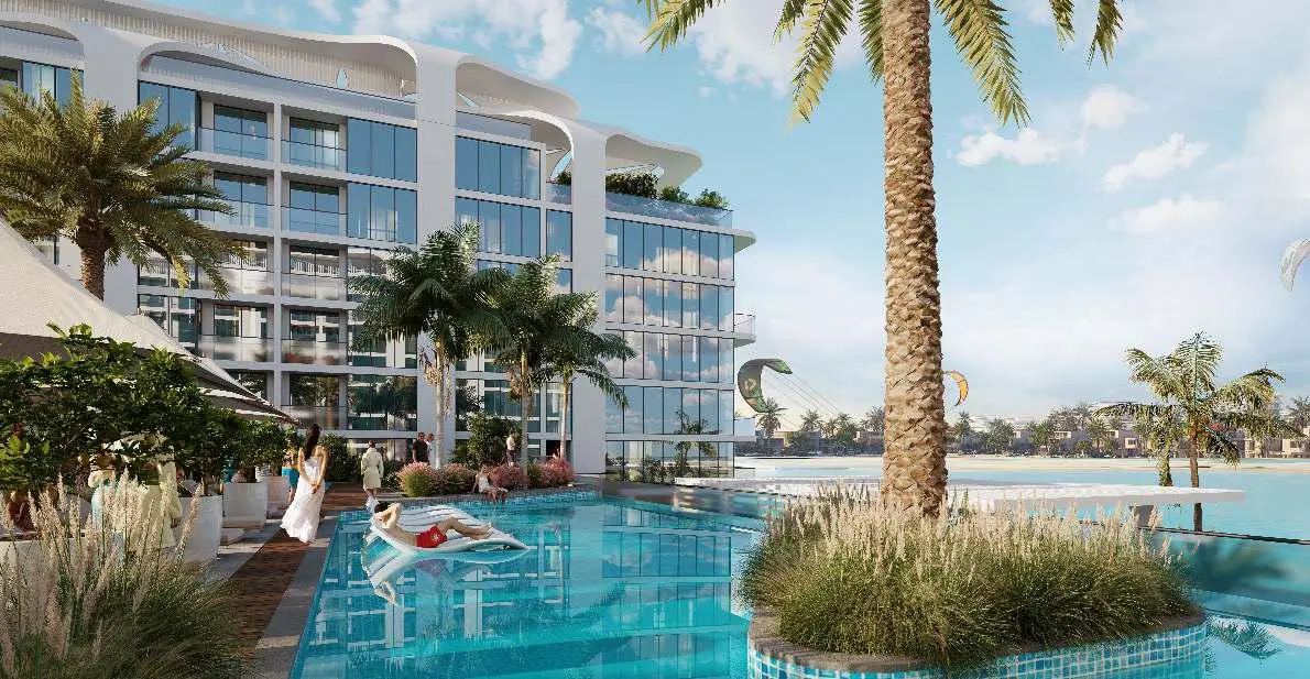 Starline Beach Residences tower design on Siniya Island, Umm Al Quwain, featuring contemporary architecture and landscaped surroundings.